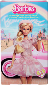 Barbie Film na podstawie filmu Margot Robbie jako figurka kolekcjonerska Barbie w różowej bluzce i tiulowej spódnicy ze stylizowaną fryzurą i pasującą biżuterią JBJ53