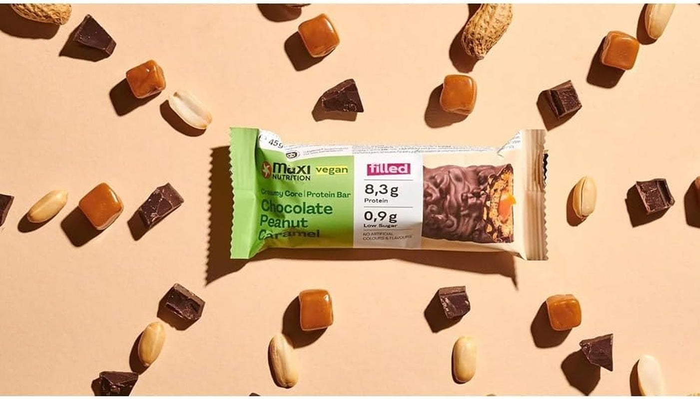 MaxiNutrition Kremowy wegański baton proteinowy z czekoladą, orzeszkami ziemnymi i karmelem 12x45g - wegański baton proteinowy, 18% białka, 8,3g w batonie, niska zawartość cukru (0,9g), bez dodatku cukru, bez sztucznych aromatów