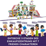 LEGO Store Friends Domek dla lalek Heartlake City Zestaw figurek dla dziewcząt i chłopców promuje rozwój społeczno-emocjonalny Prezent dla 8-latków 42604 Zestawy do budowania Besuche den LEGO-Store