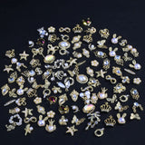 50 szt. złotych zawieszek do paznokci, mieszane style Glitzersteine ​​​​Nägel Perle Legierung Nagel Steine ​​Blume Schmetterling Strasssteine ​​Nägel Herz Stern Nagel Charms DIY Nail Art Zubehör Frauen Nägel Deko