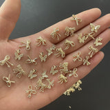 50Stück 3D Złota kokardka Charms do paznokci Motyl Nail Art Charms Legierung Bogen Nagel Charms Nägel Zubehör Schleife Nagelschmuck Metall Schleifen Schmetterling Nageldesign Nagelanhänger Nailart Strasssteine
