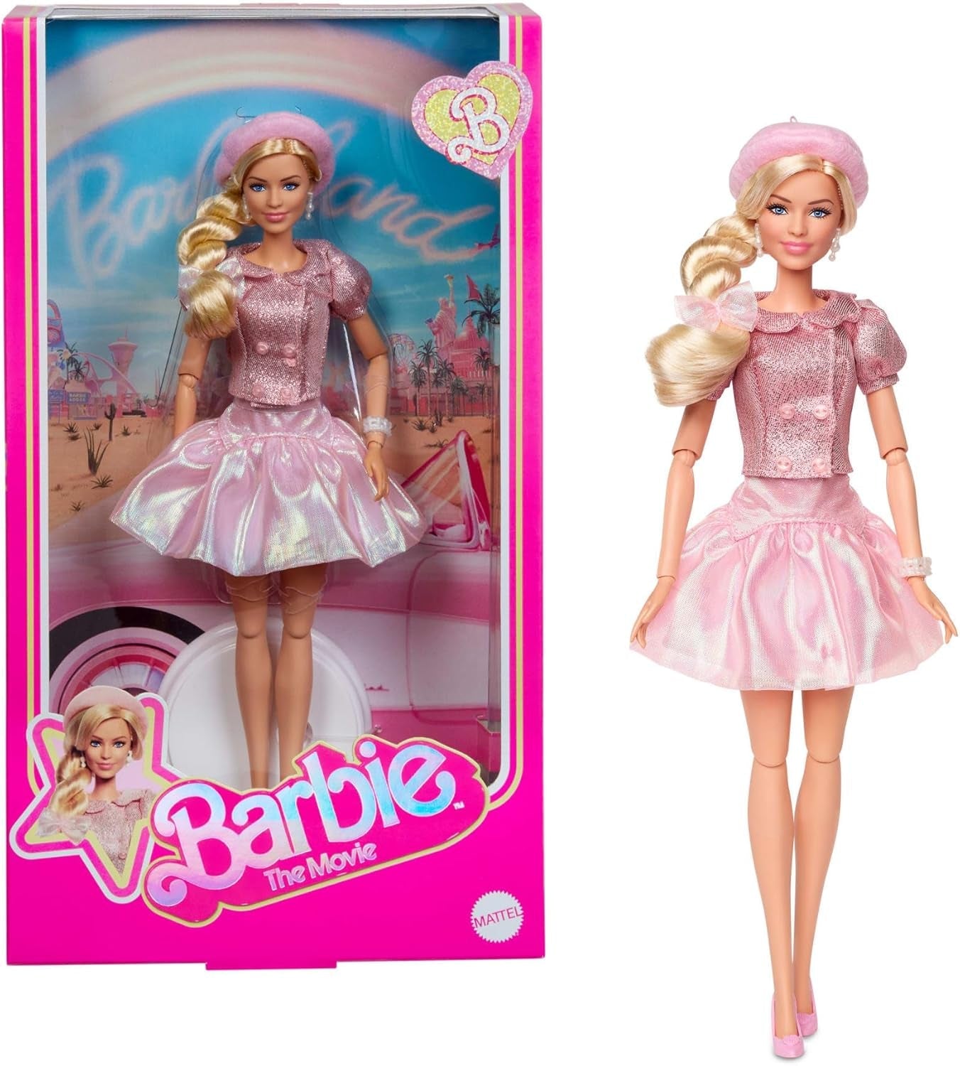 Barbie Film na podstawie filmu Margot Robbie jako figurka kolekcjonerska Barbie w różowej bluzce i tiulowej spódnicy ze stylizowaną fryzurą i pasującą biżuterią JBJ53