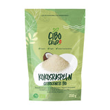 Rozdrobniony organiczny kokos - 200g. Suszone chipsy kokosowe Niesłodzone i suche. Coconut flakes. Suszone na słońcu chipsy kokosowe. Doskonała jako przekąska i do słodkich przepisów. Naty Shop Produkty Suszone 250 G (1 Op.) Tarty Kokos