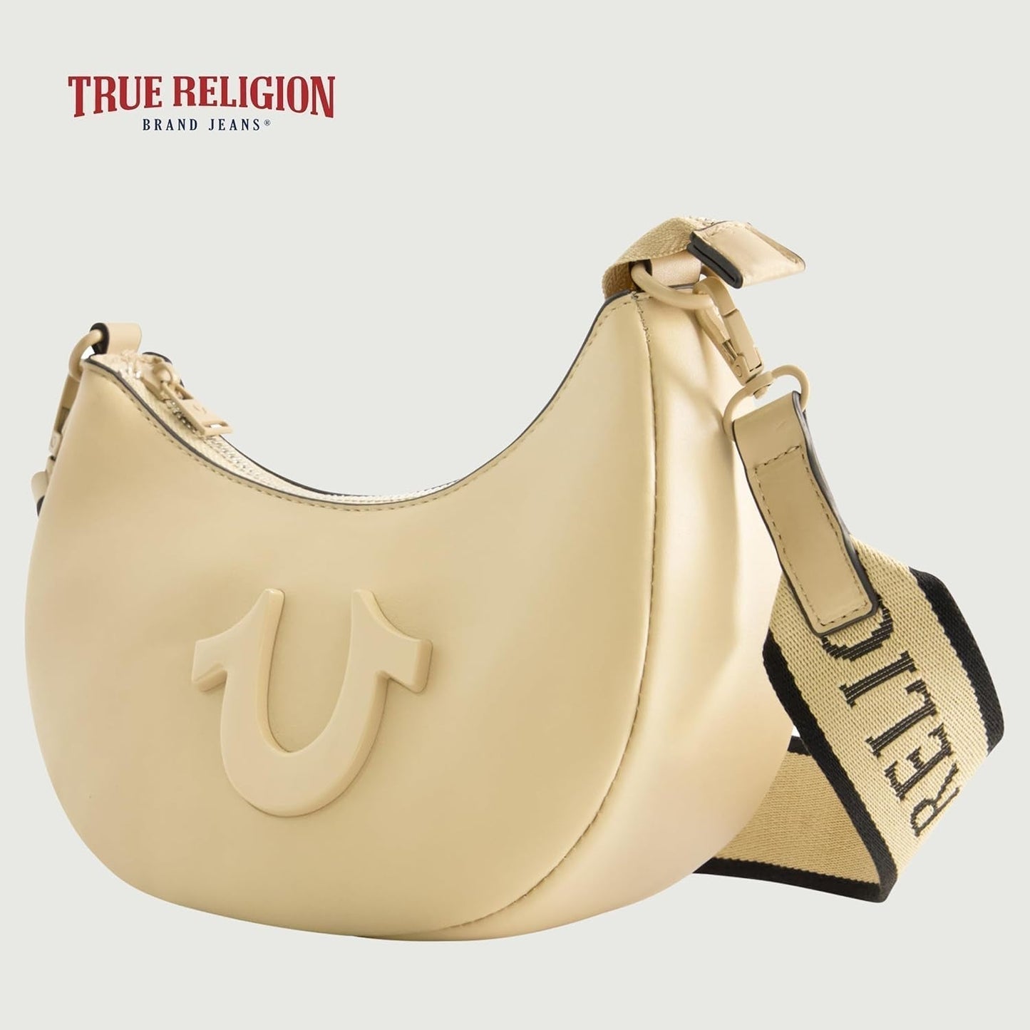 Damska torebka na ramię True Religion, torebka Hobo w kształcie półksiężyca z regulowanym, odpinanym paskiem i logo podkowy Torby damskie Naty Shop