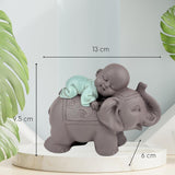 Posąg Zen'Light Budda Bonze śpiący na słoniu - Atmosfera Zen w Twojej świętej przestrzeni - piękna pomyślna figura - wys. 9,5 cm, brązowo-zielona. Figurki i rzeźby Naty Shop